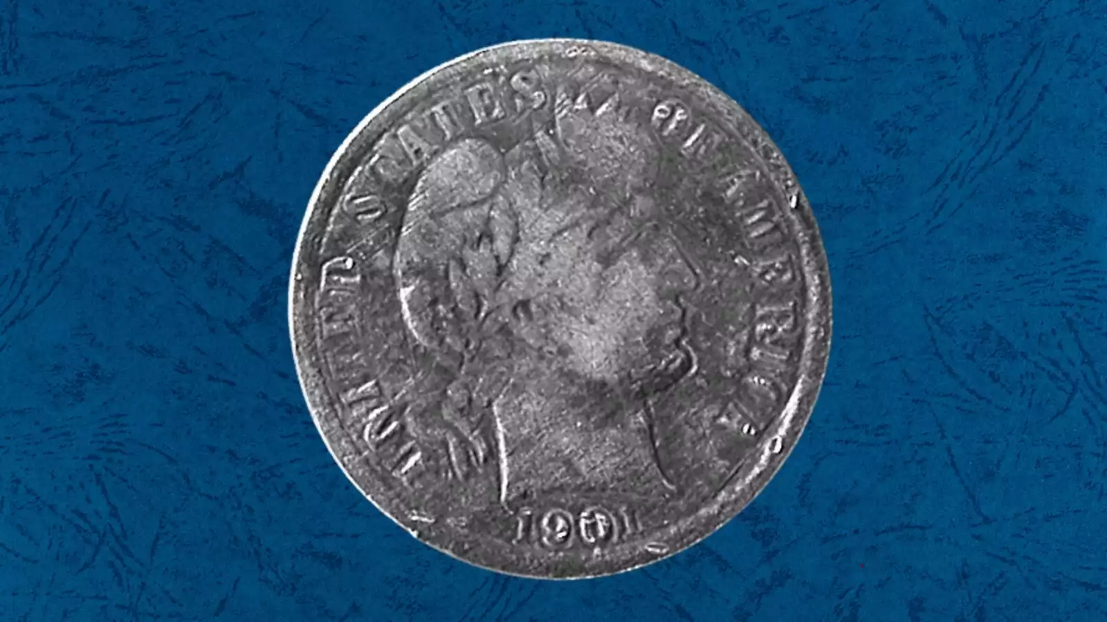 1901 Barber dime multiple strike error showing two overlapping die impressions with rotated or offset secondary strike visible on Liberty head
